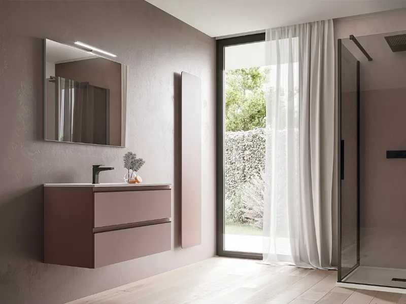 Colori eleganti, essenziali prese a gola e lavabo integrato per il mobile sospeso System di Ideagroup