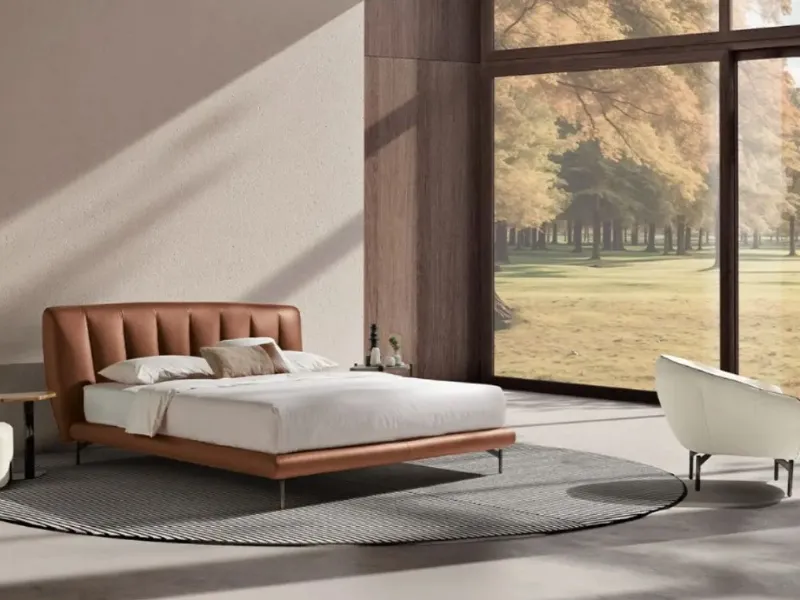 Perla di Max Divani con rivestimento in pelle