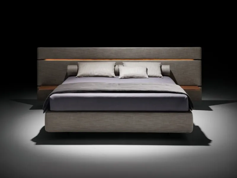 Letto Infinito di Twils: testiera tessile con inserti in legno