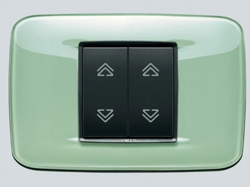doppio interruttore con placca verde acqua,